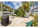 Community courtyard with BBQ grills and seating areas at 5728 14Th N Ave # 305B, St Petersburg, FL 33710