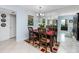 Elegant dining room with a table for four and mirrored wall at 5728 14Th N Ave # 305B, St Petersburg, FL 33710