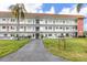 Two-story building with landscaped grounds and parking at 5728 14Th N Ave # 305B, St Petersburg, FL 33710