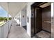 Building hallway with elevator and access to units at 5728 14Th N Ave # 305B, St Petersburg, FL 33710