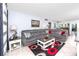 Spacious living room with sectional sofa and coffee table at 5728 14Th N Ave # 305B, St Petersburg, FL 33710