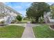 Pathway through a well-maintained community courtyard at 5855 18Th N St # 16, St Petersburg, FL 33714