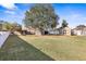 Large backyard with storage shed and mature trees at 6515 Clair Shore Dr, Apollo Beach, FL 33572
