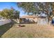 Large backyard with shed and view of lake at 6515 Clair Shore Dr, Apollo Beach, FL 33572