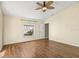 Bedroom featuring wood-look floors and a ceiling fan at 6515 Clair Shore Dr, Apollo Beach, FL 33572