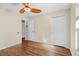 Bright bedroom with wood-look floors and double door closet at 6515 Clair Shore Dr, Apollo Beach, FL 33572
