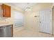 Small dining area with tile floor and access to kitchen at 6515 Clair Shore Dr, Apollo Beach, FL 33572
