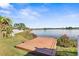 Elevated wooden dock providing scenic lake views at 6515 Clair Shore Dr, Apollo Beach, FL 33572