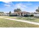 Single-story home with front yard at 6515 Clair Shore Dr, Apollo Beach, FL 33572