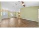 Bright living room with laminate floors and neutral walls at 6515 Clair Shore Dr, Apollo Beach, FL 33572
