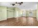 Large living room with laminate flooring, high ceilings and plenty of natural light at 6515 Clair Shore Dr, Apollo Beach, FL 33572