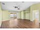 Open living room with vaulted ceilings and a neutral color palette at 6515 Clair Shore Dr, Apollo Beach, FL 33572
