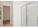 Clean bathroom with walk-in shower and closet at 6659 Depue Dr, Wesley Chapel, FL 33545