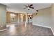 Spacious living area with hardwood floors and multiple windows providing ample natural light at 7001 Interbay Blvd # 197, Tampa, FL 33616