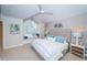 Spacious bedroom with a king-size bed and built-in window seat at 732 Pinellas Bayway S, Tierra Verde, FL 33715