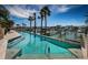 Relaxing community pool with water view at 732 Pinellas Bayway S, Tierra Verde, FL 33715