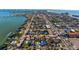 Aerial view highlighting the home's waterfront location at 8300 Boca Ciega Dr, St Pete Beach, FL 33706