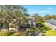 Two-story house with landscaping and large yard at 9244 Rhea Dr, Odessa, FL 33556