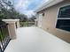 Private deck overlooking the backyard and trees at 9244 Rhea Dr, Odessa, FL 33556