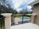 Deck with a view of the pool and surrounding landscape at 9244 Rhea Dr, Odessa, FL 33556