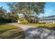 Curved driveway leading to two-story house at 9244 Rhea Dr, Odessa, FL 33556