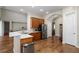 Spacious kitchen with stainless steel appliances and hardwood floors at 9244 Rhea Dr, Odessa, FL 33556