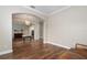 Spacious living room featuring hardwood floors and archways to other rooms at 9244 Rhea Dr, Odessa, FL 33556