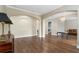 Bright and airy living space featuring archways and hardwood floors at 9244 Rhea Dr, Odessa, FL 33556