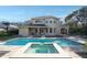 Luxury pool and spa with a spacious patio area at 9244 Rhea Dr, Odessa, FL 33556