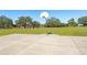 Outdoor basketball court with a single hoop at 9406 Citrus Glen Pl, Tampa, FL 33618