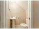 Small bathroom with pedestal sink and toilet at 9406 Citrus Glen Pl, Tampa, FL 33618