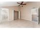 Spacious bedroom with bathroom access and closet at 9406 Citrus Glen Pl, Tampa, FL 33618