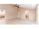 Bright bedroom with bathroom access and vaulted ceiling at 9406 Citrus Glen Pl, Tampa, FL 33618