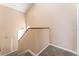 Upstairs hallway with carpeted floors at 9406 Citrus Glen Pl, Tampa, FL 33618