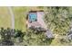 Aerial view of house with pool at 1017 Royal Birkdale Dr, Tarpon Springs, FL 34688