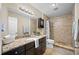 Clean bathroom with granite vanity and shower/tub combo at 11201 Knotty Pine Dr, New Port Richey, FL 34654