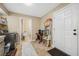 Pantry with shelving and storage, adjacent to laundry and bath at 11201 Knotty Pine Dr, New Port Richey, FL 34654