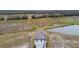 Aerial view of a house near a pond at 12213 Tranquil Waters Ter, Parrish, FL 34219