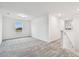 Upstairs bedroom with gray carpet and window at 12213 Tranquil Waters Ter, Parrish, FL 34219