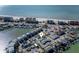 Aerial view showing home's location near the water and other houses at 13708 Salem St, Madeira Beach, FL 33708