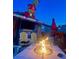 Backyard with fire pit and holiday decorations at 13708 Salem St, Madeira Beach, FL 33708