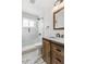 Updated bathroom with walk-in shower and wood vanity at 14198 89Th Ave, Seminole, FL 33776