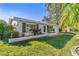 Front view of house showcasing well-manicured lawn at 14198 89Th Ave, Seminole, FL 33776