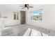 Living Room with light walls, hardwood floors and ceiling fan at 14198 89Th Ave, Seminole, FL 33776