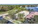 Aerial view of house and lakefront community at 15902 Golden Lakes Dr, Wimauma, FL 33598