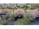 Aerial view of a row of villas with brown roofs and green trees at 1849 Bough Ave # D, Clearwater, FL 33760