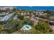 Aerial view of community and waterfront with pool at 1849 Bough Ave # D, Clearwater, FL 33760