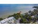Aerial view of waterfront property with houses and bridge at 1849 Bough Ave # D, Clearwater, FL 33760