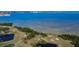 Aerial view of waterfront property with golf course at 1849 Bough Ave # D, Clearwater, FL 33760