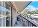 Private balcony with seating and views of the community at 1849 Bough Ave # D, Clearwater, FL 33760